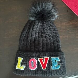 Jocelyn Knitted Love Faux Fur Hat in Black